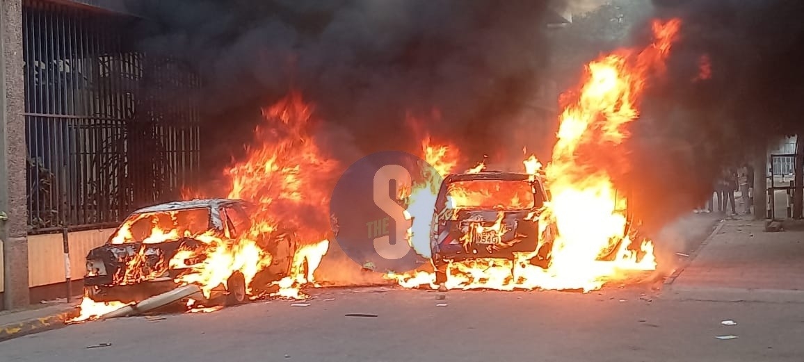 Protesters torch two vehicles along Aga Khan Walk