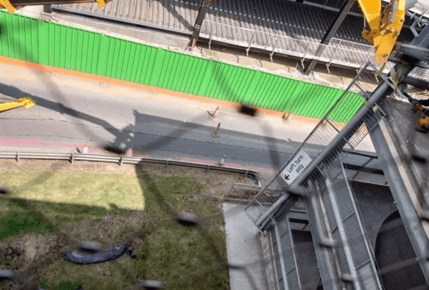 Man hurt after vehicle falls from airport car park