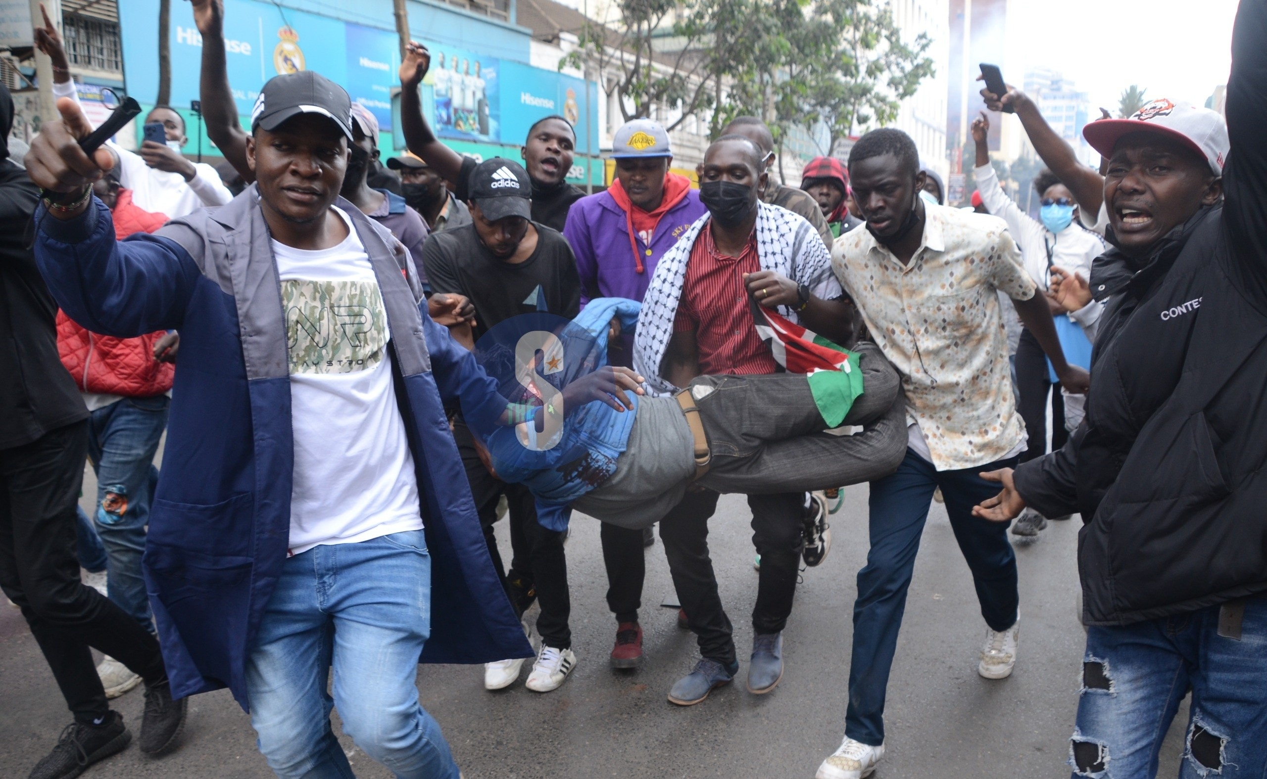 Outrage as police shoot mask vendor during protests