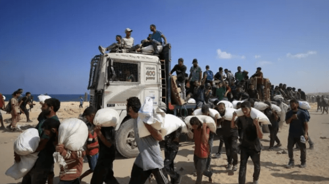 Israeli forces kill 67 Palestinians seeking aid in northern Gaza