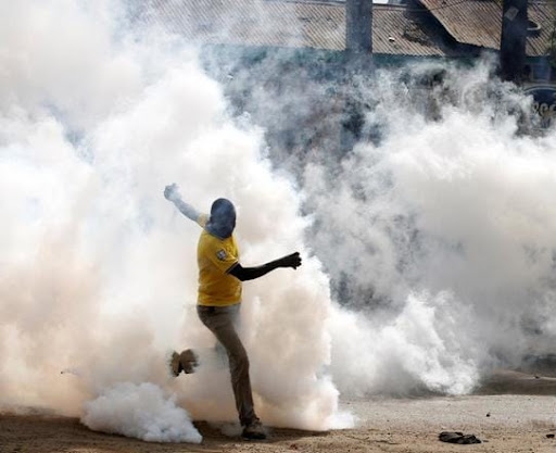 Panic as unknown man hurls tear gas at women forum