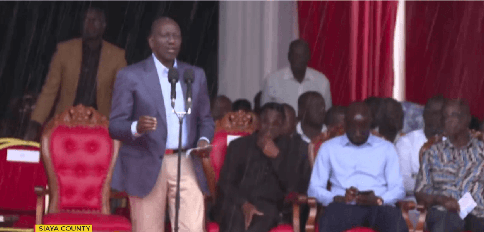 Ruto braves rain to address faithful during service
