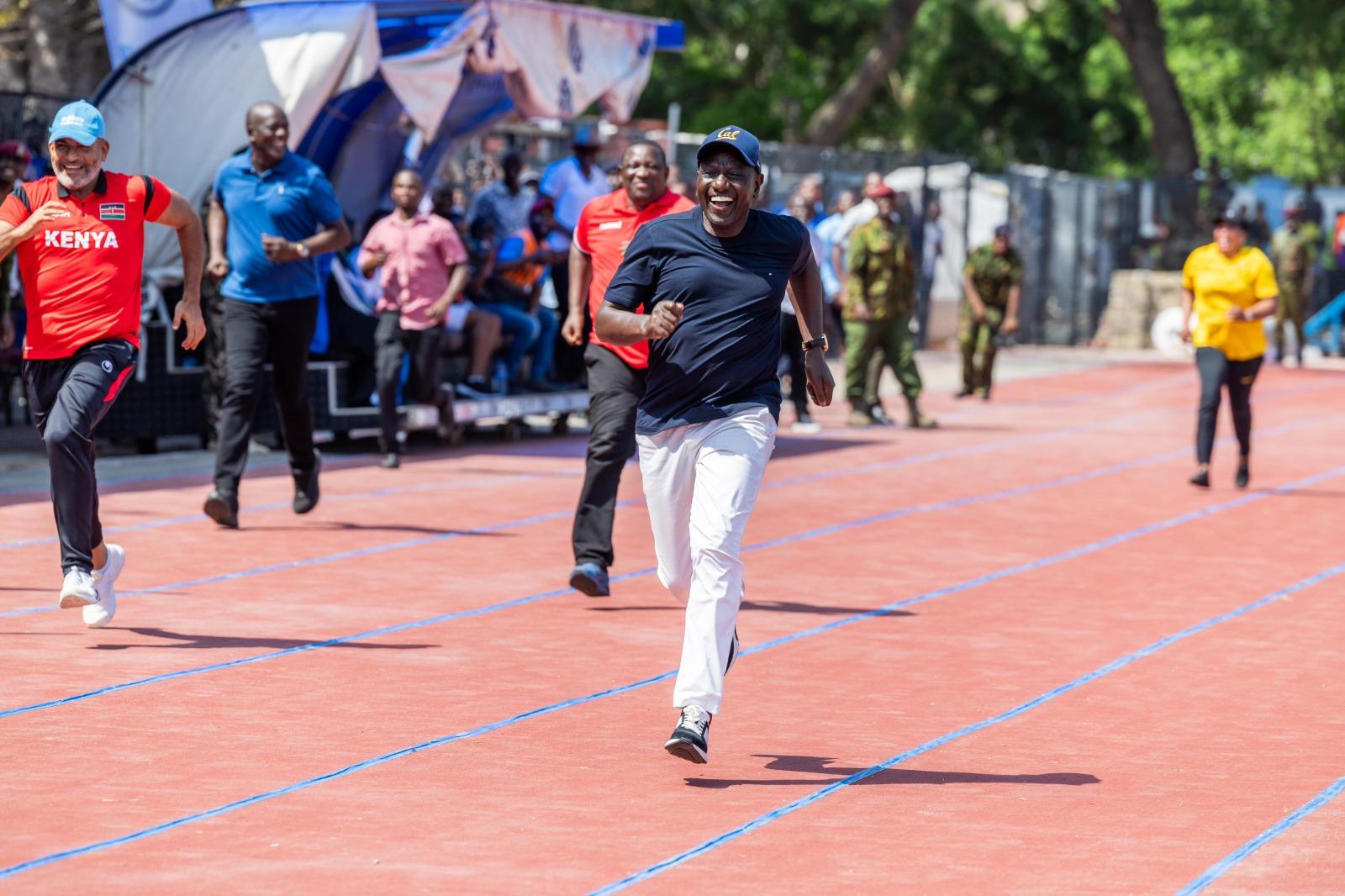 PHOTOS: Ruto showcases running skills at EAC Games