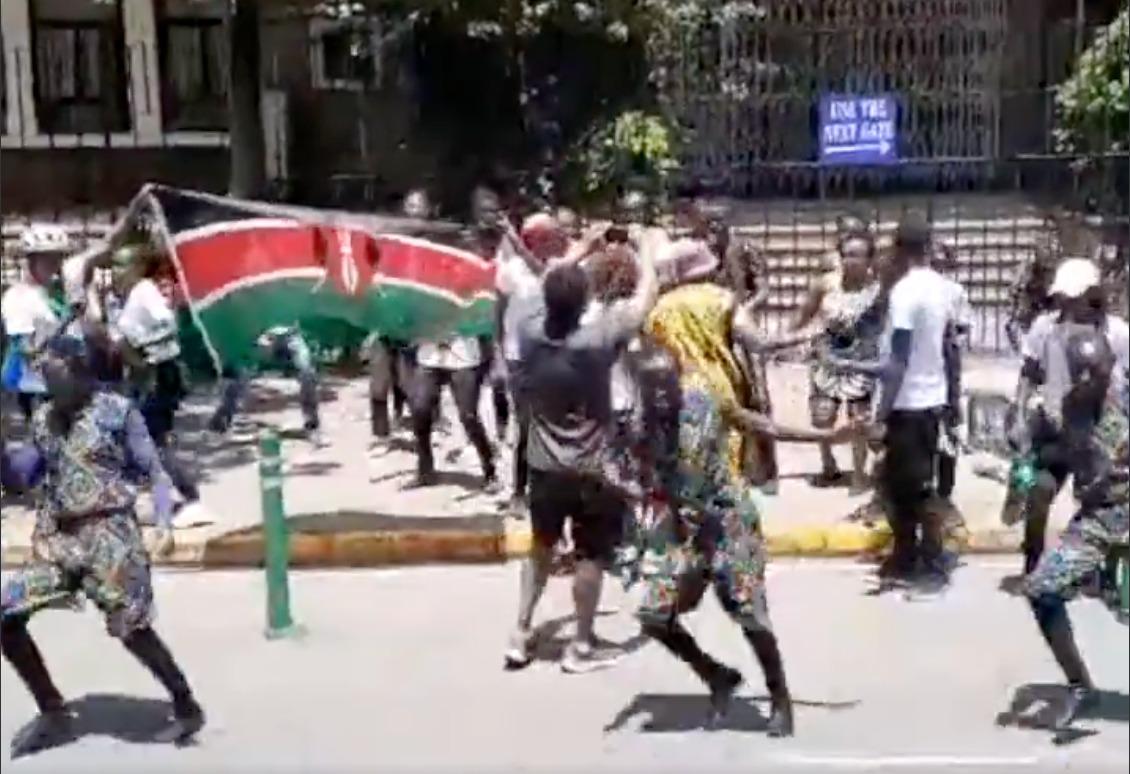 Kenyans dance outside Foreign Affairs office in support of Raila AUC bid