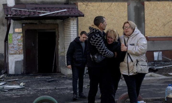 Wave of Russian strikes kill at least 20 and injure dozens